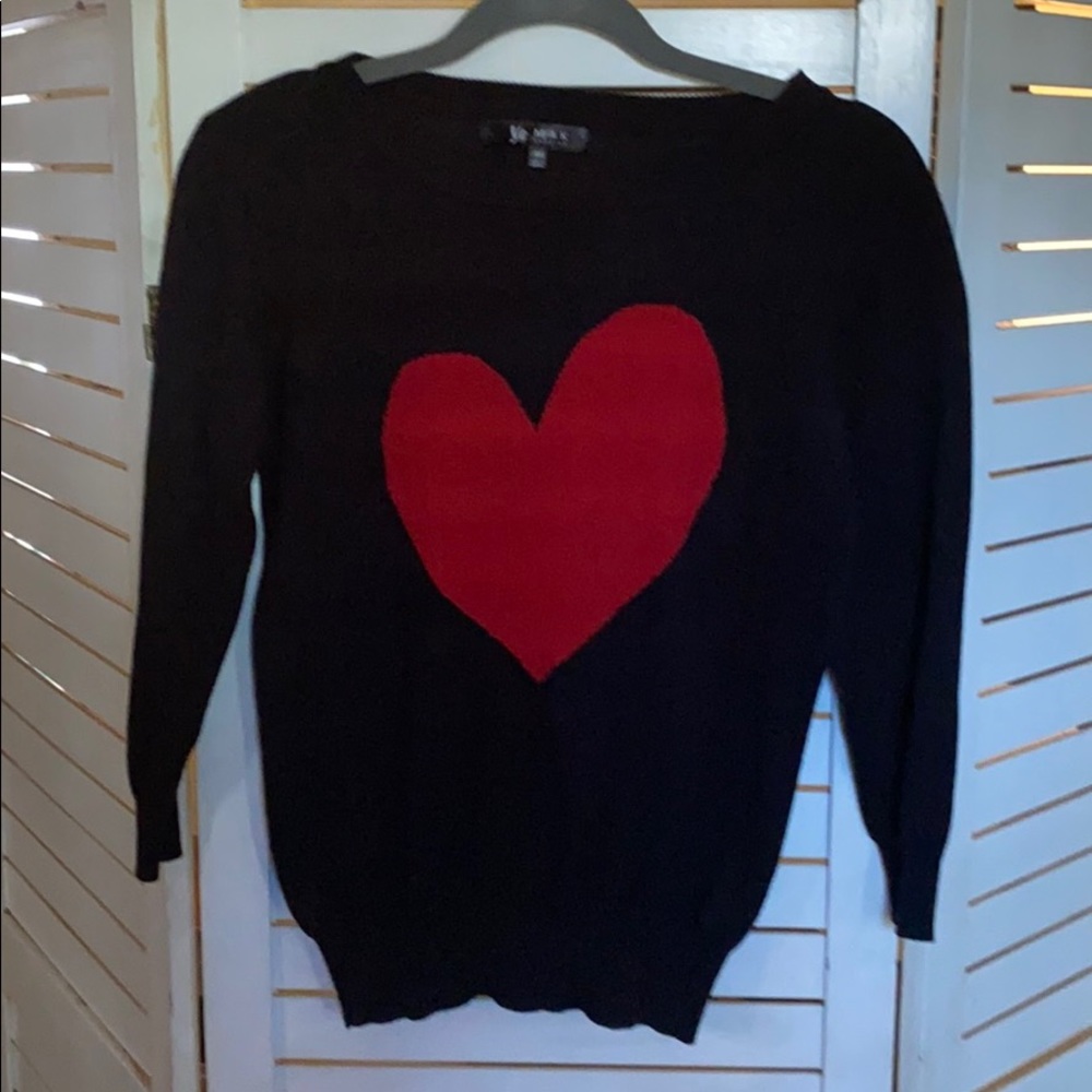 Cute heart sweater from Vintage online boutique.